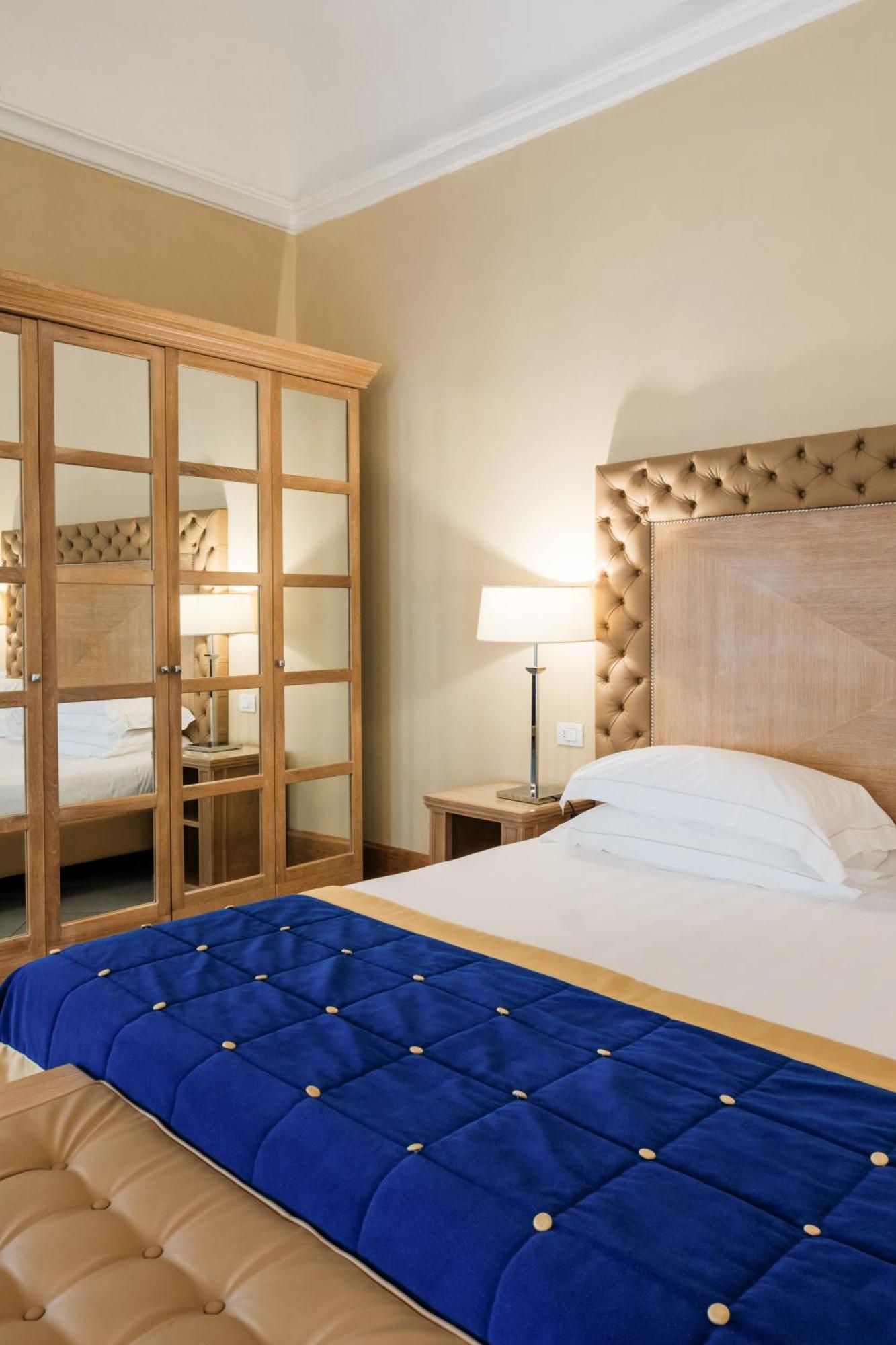 วิลล่า โตโลเม โฮเทล แอนด์ รีสอร์ต ฟลอเรนซ์ ภายนอก รูปภาพ A bedroom at the hotel