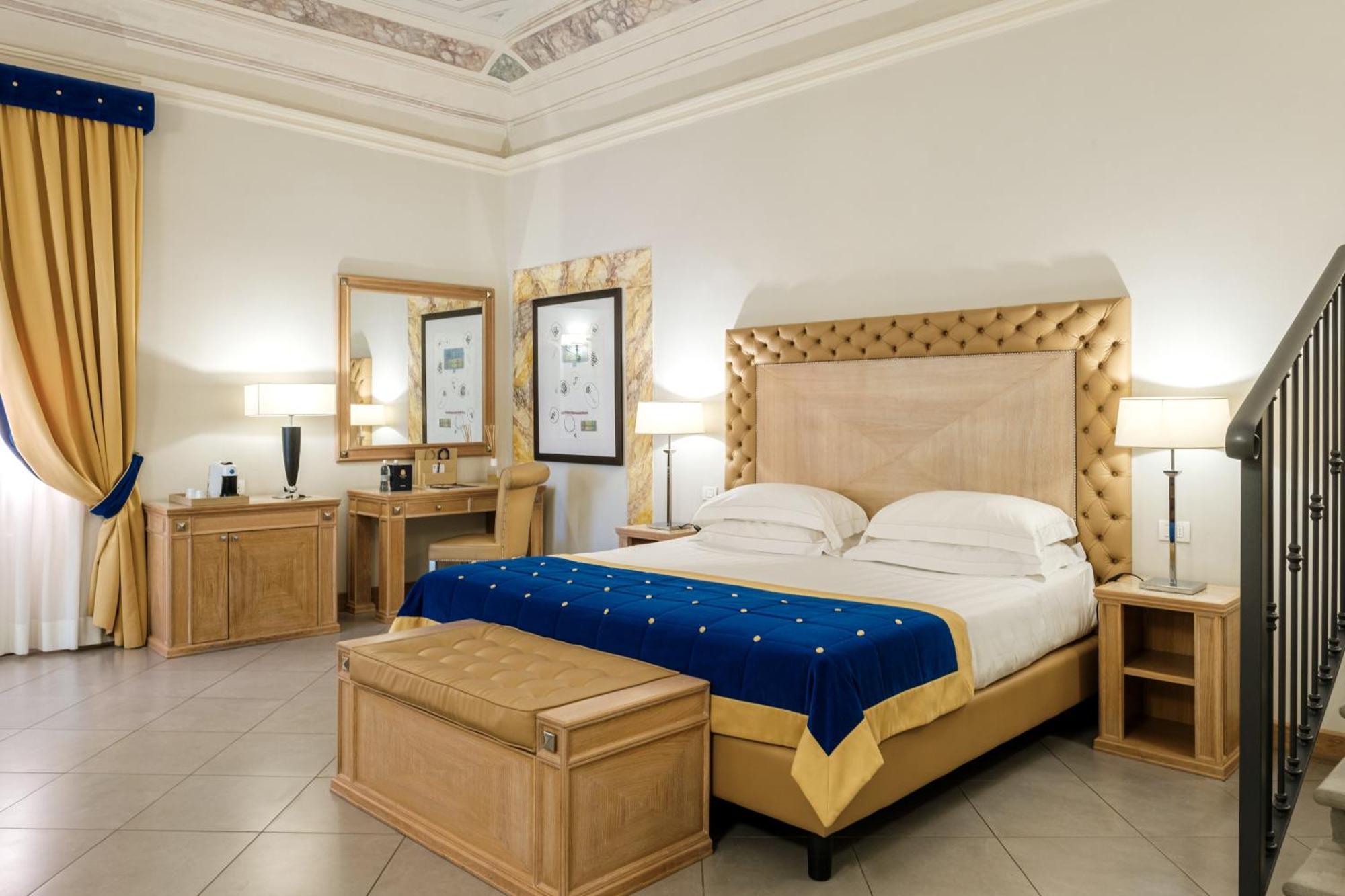 วิลล่า โตโลเม โฮเทล แอนด์ รีสอร์ต ฟลอเรนซ์ ภายนอก รูปภาพ A bedroom at the hotel