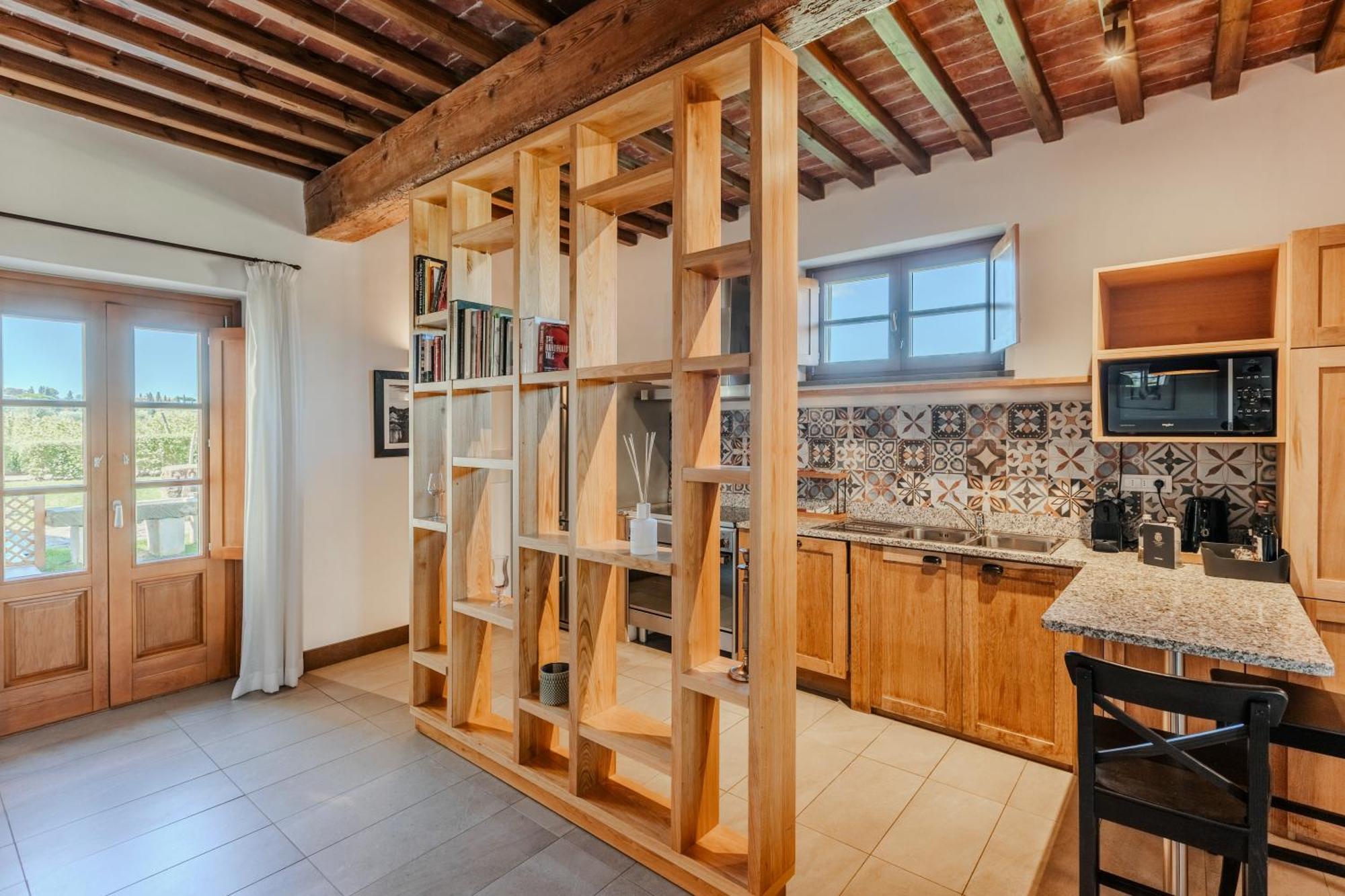 วิลล่า โตโลเม โฮเทล แอนด์ รีสอร์ต ฟลอเรนซ์ ภายนอก รูปภาพ A room divider in a kitchen