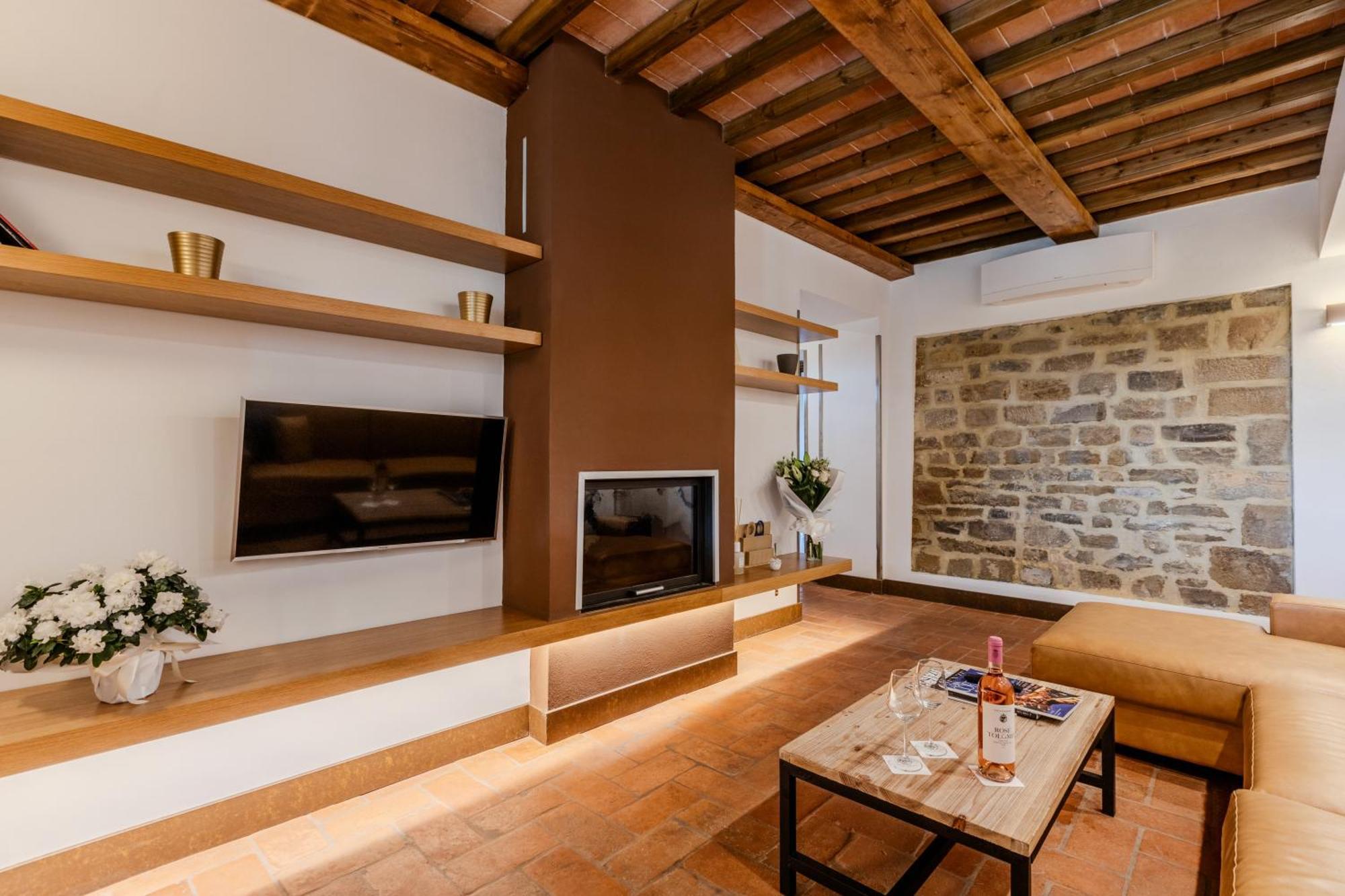 วิลล่า โตโลเม โฮเทล แอนด์ รีสอร์ต ฟลอเรนซ์ ภายนอก รูปภาพ A living room in a hotel